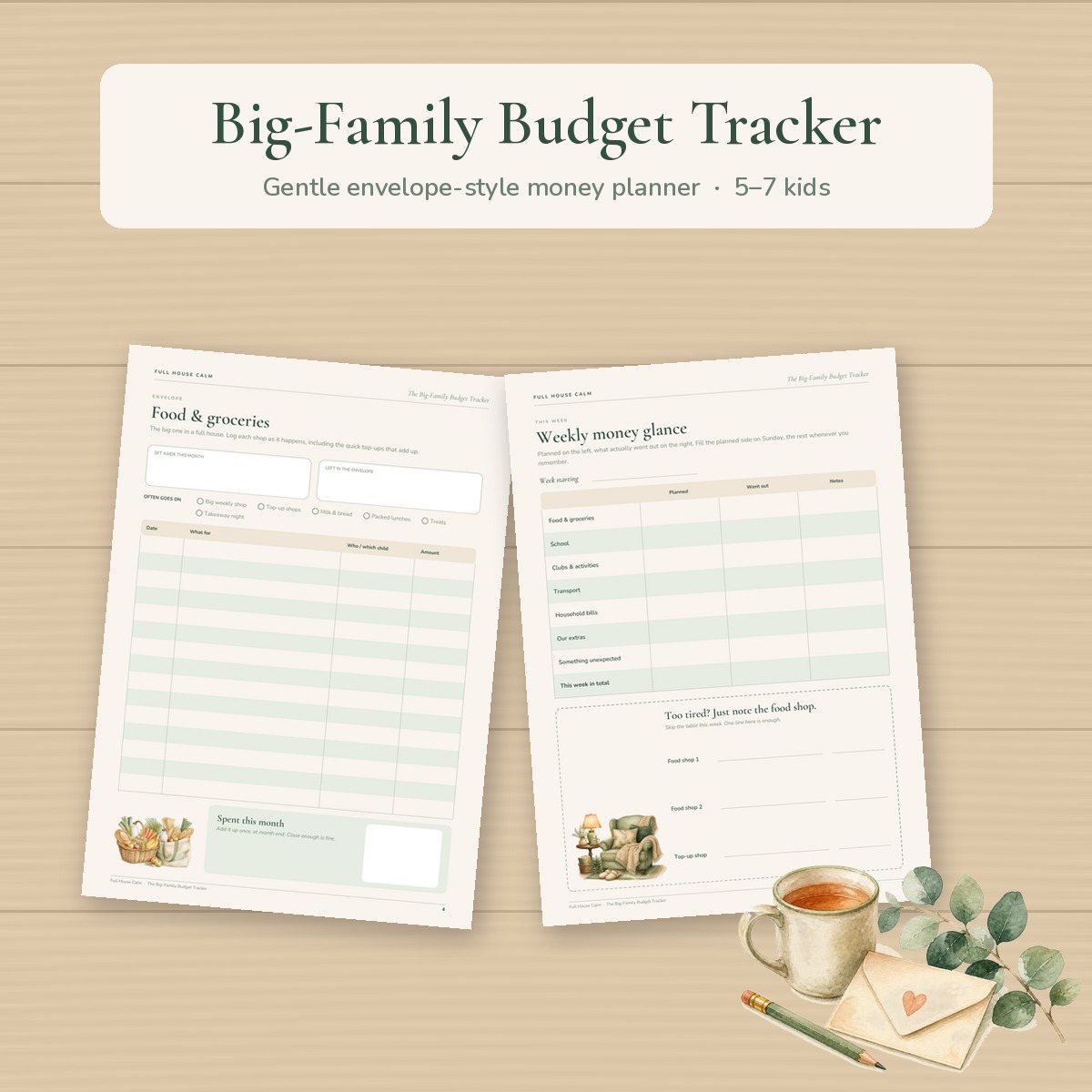 The Big-Family Budget Tracker pages laid out on a pale oak kitchen counter